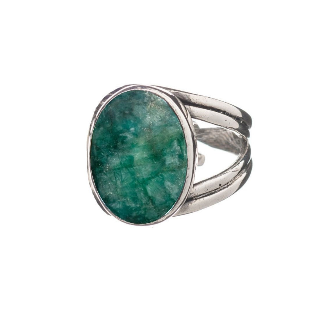 The Dewberry Ring by Gallardo & Blaine Designs features a large oval green gemstone set in sterling silver with a simple split-band design, making a bold statement piece. Displayed on a white background.