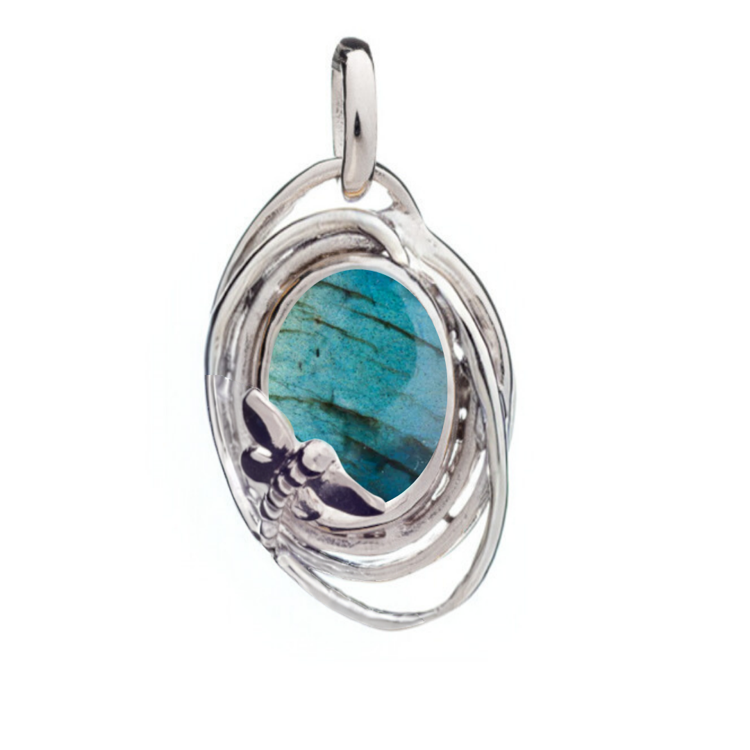 The Lagoon Pendant Small by Gallardo & Blaine Designs features a blue-green gemstone center set in an intricate silver frame with a butterfly motif—an elegant choice for any occasion.