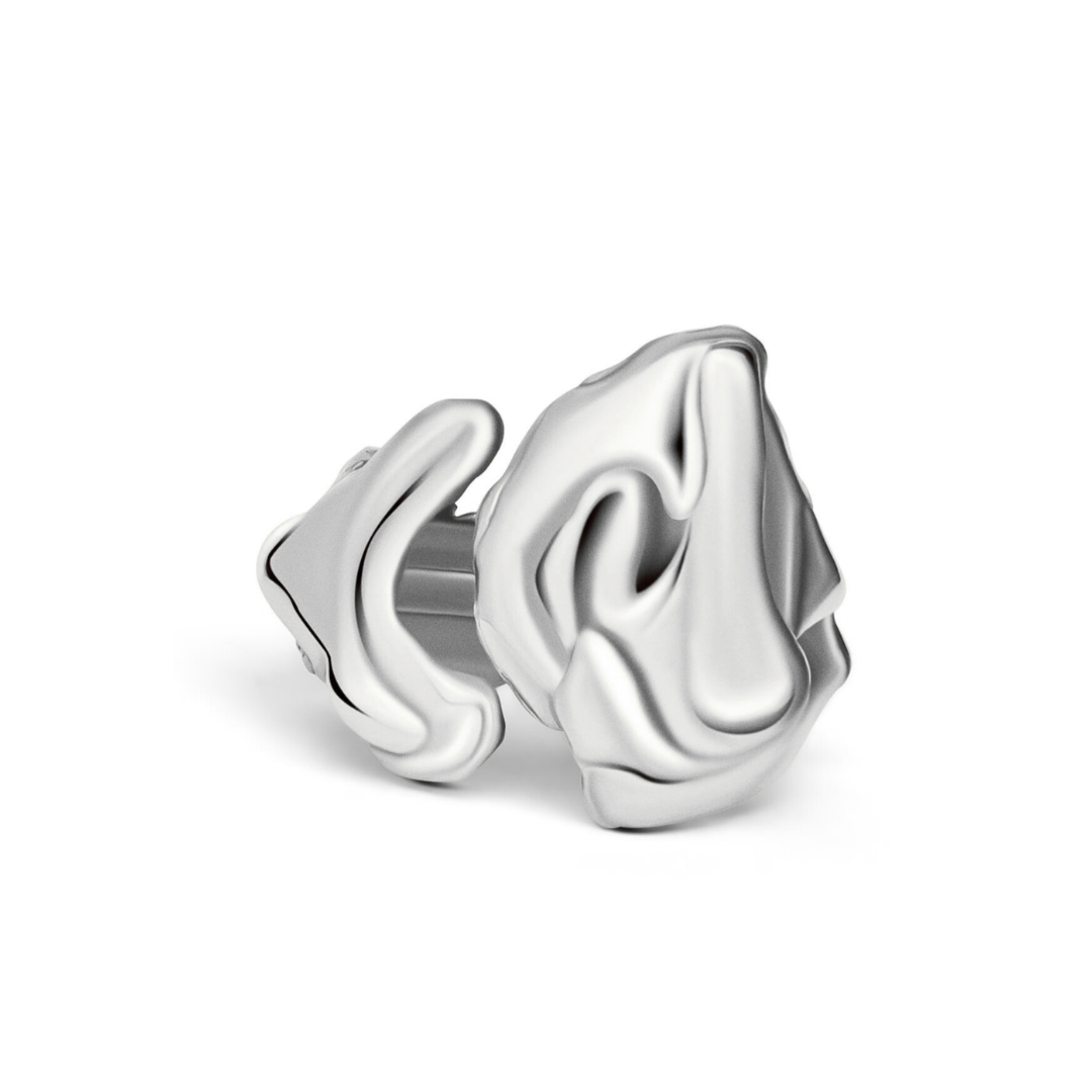A gleaming, sculptural silver Blaze Ring by Madeleine Blaine—with abstract, wavy contours reminiscent of hand-carved artistry—displayed on a white background.