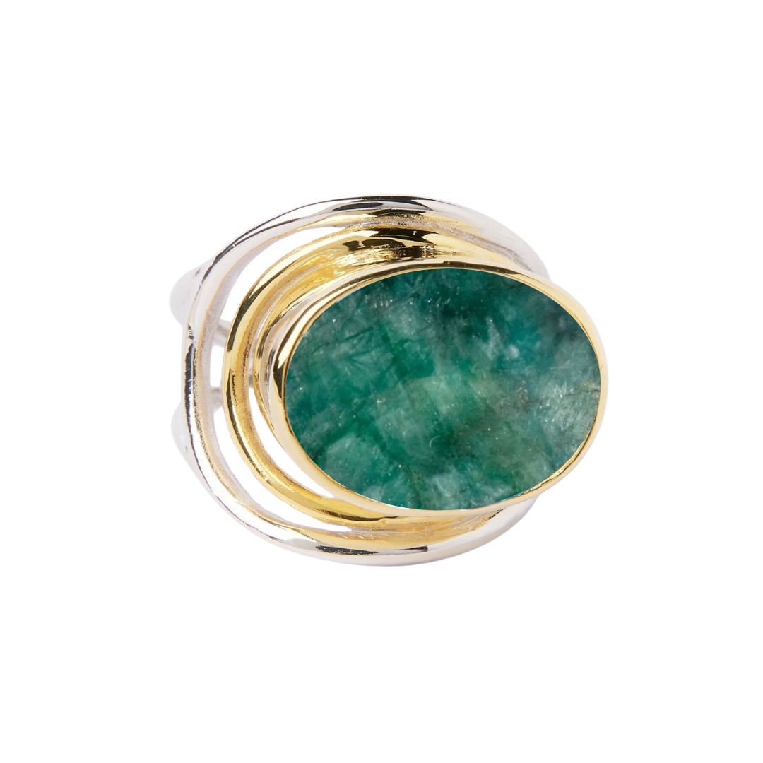 The Party Ring by Gallardo & Blaine Designs showcases a bold oval green gemstone on a gold and sterling silver band with an artistic swirl.