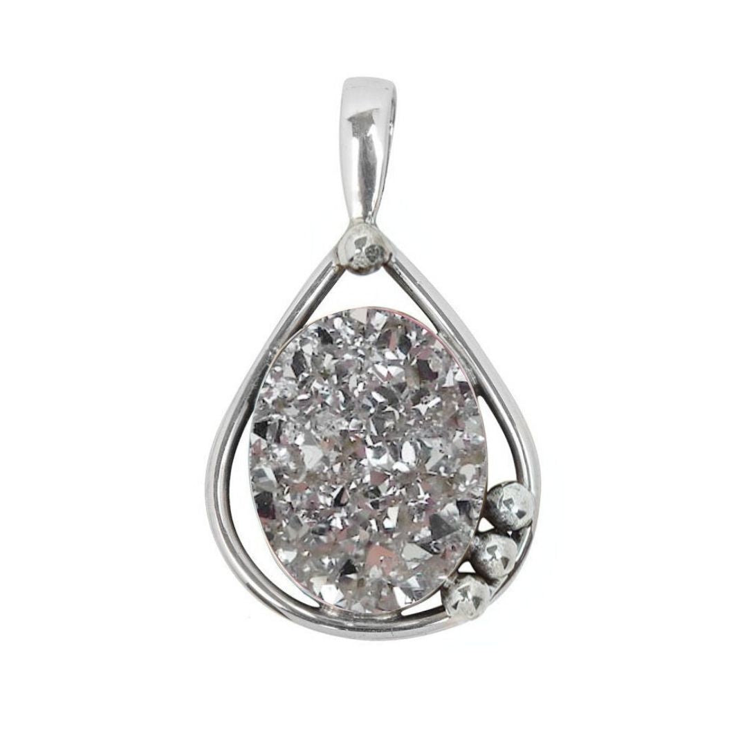 The Poppy Pendant Small by Gallardo & Blaine Designs features a teardrop-shaped oval gemstone set in sterling silver, accented with three small silver beads at the bottom right side.