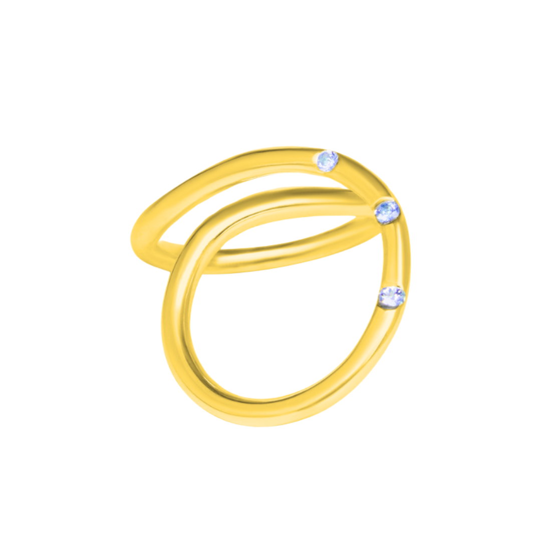 The Sea Honey Ring by Gallardo & Blaine Designs features an abstract, open design with three small round white gemstones along its curved bands, shown on a white background.