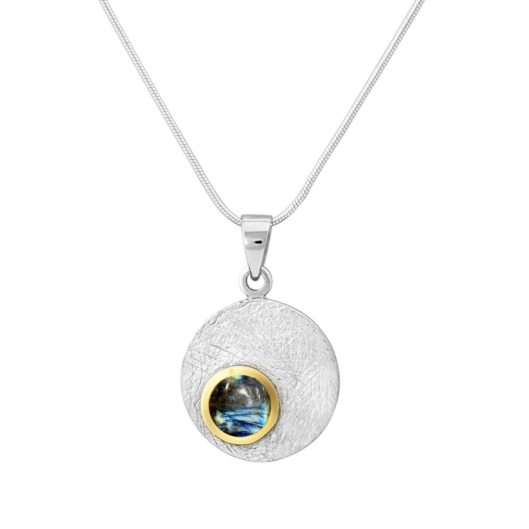 The Selene Necklace Silver - Small by Gallardo & Blaine Designs features a textured sterling silver disc and your choice of gemstone set in a gold bezel, all on a delicate chain—a personalized piece for any occasion.