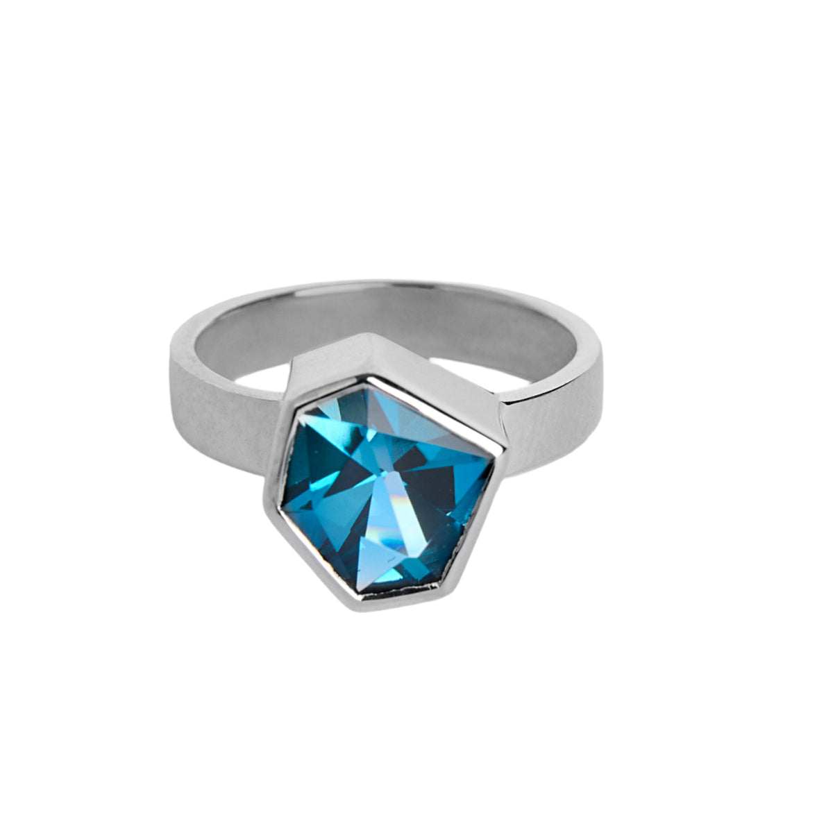 Silver ring with large, irregular hexagonal blue topaz in a silver bezel. Band is flat and 4mm wide