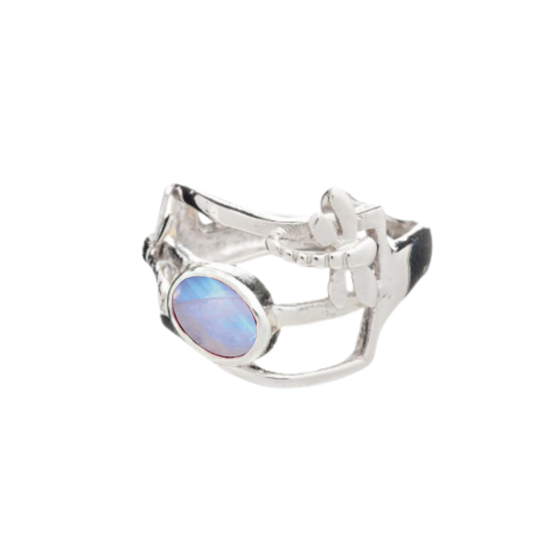 The Small Dragonfly Ring by Gallardo & Blaine Designs features an open silver and gold plated band with an iridescent oval opal gemstone—an elegant, organic jewelry piece.