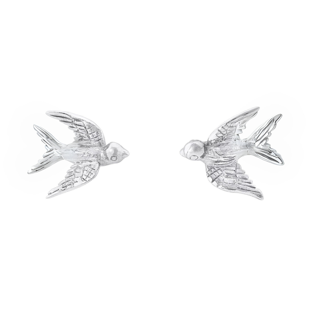 The Wildlife Swallow Studs by Watermelon Tropical feature detailed swallows facing each other in sterling silver or gold, blending elegance with Irish charm.