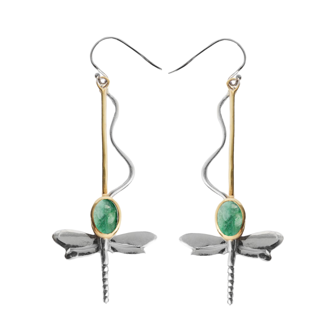The Willow Earrings in Various Gemstones by Gallardo & Blaine Designs feature dragonfly dangles with silver wings, gold and silver accents, and a central green oval gemstone—an elegant accessory for any outfit.