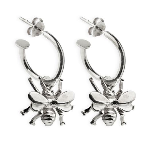The Gallardo & Blaine Designs Wildlife Bee Huggies are a unique and eye-catching piece from the Wildlife Collection. Available in silver or gold, these hoop earrings feature detailed bee charms with intricately designed wings and bodies that hang from the
