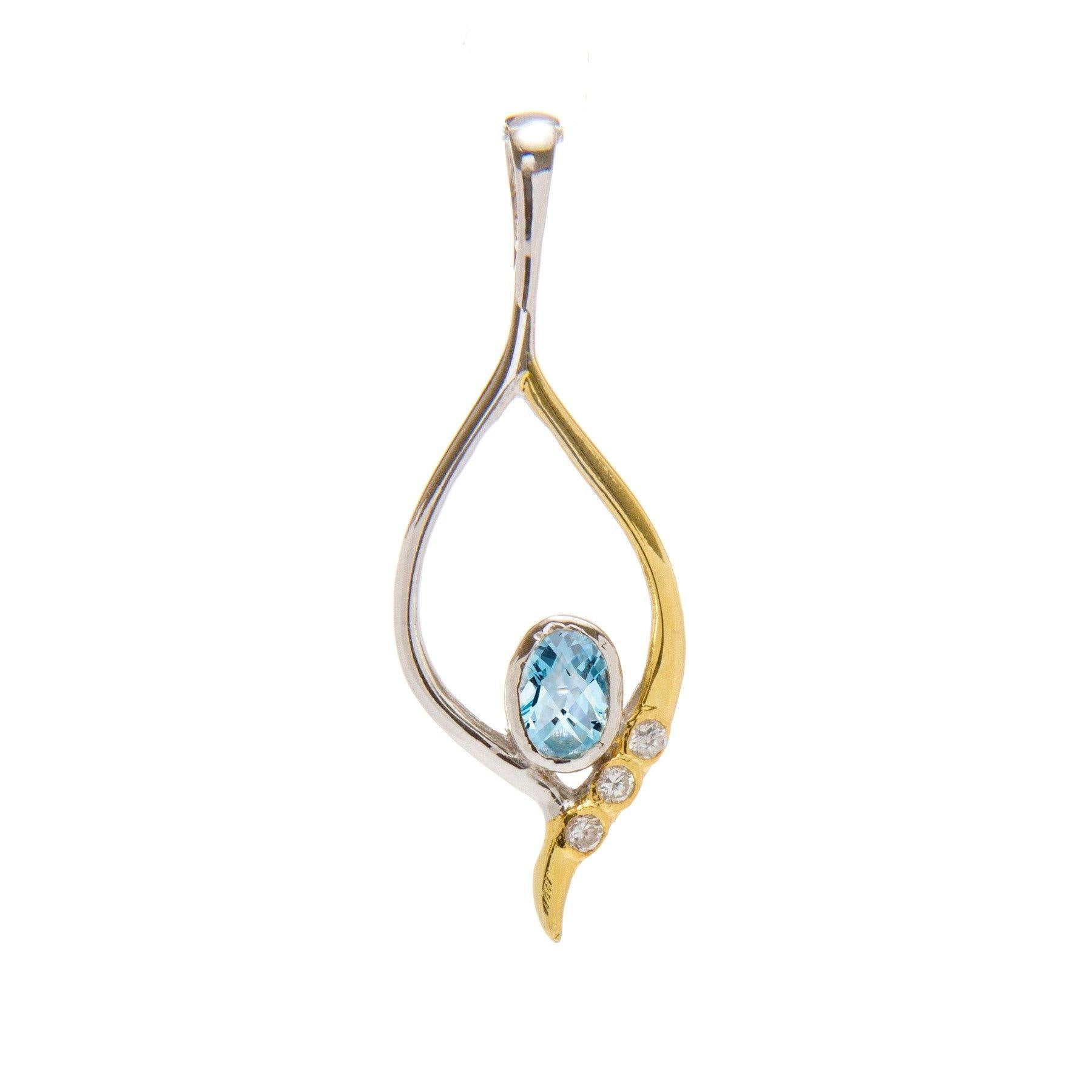A Desert Star Pendant in various gemstones featuring an elegant, swirling gold vermeil and sterling silver design. It encloses a blue, oval-shaped gemstone and three small round diamonds adorned on the gold side. The pendant has a contemporary, delicate a