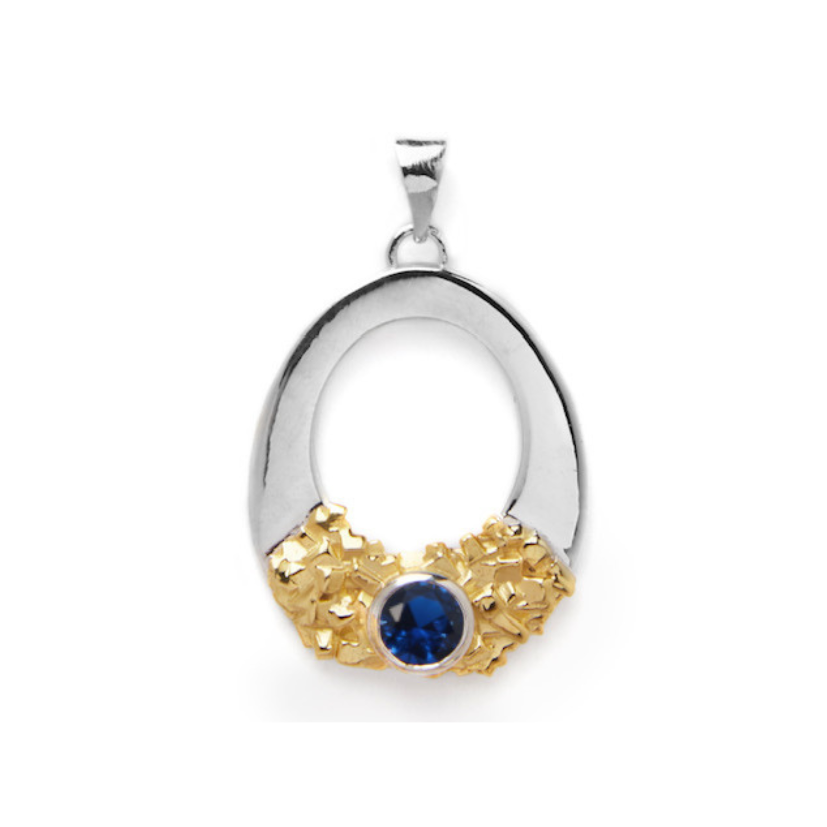 Introducing the Giselle Pendant by Gallardo & Blaine Designs: a stunning sterling silver oval pendant adorned with a cluster of small gold accents at the bottom, showcasing a large, round blue gemstone set elegantly in the center of the gold accents. The