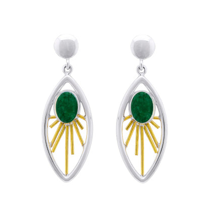 A pair of elegant Goddess Earrings in various gemstones by Gallardo & Blaine Designs, featuring a sterling silver teardrop shape with gold sunburst designs at the center. Each earring has a green oval gemstone in the middle of the sunburst and a silver ba