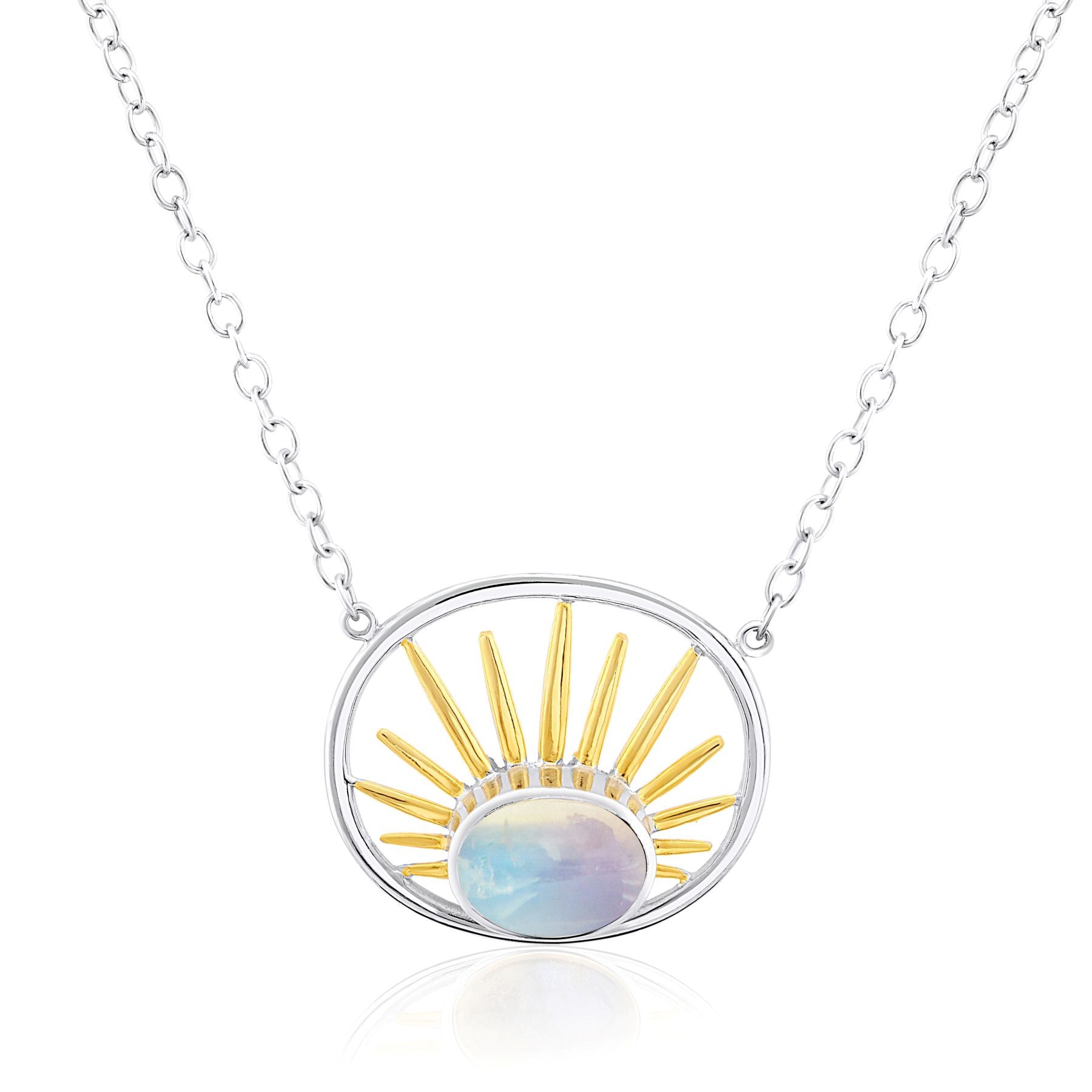 The Goddess Necklace Small in various gemstones by Gallardo & Blaine Designs features a sterling silver chain and a circular pendant with a design resembling a sun. The pendant has golden rays radiating from a central opalescent stone, creating a captivat