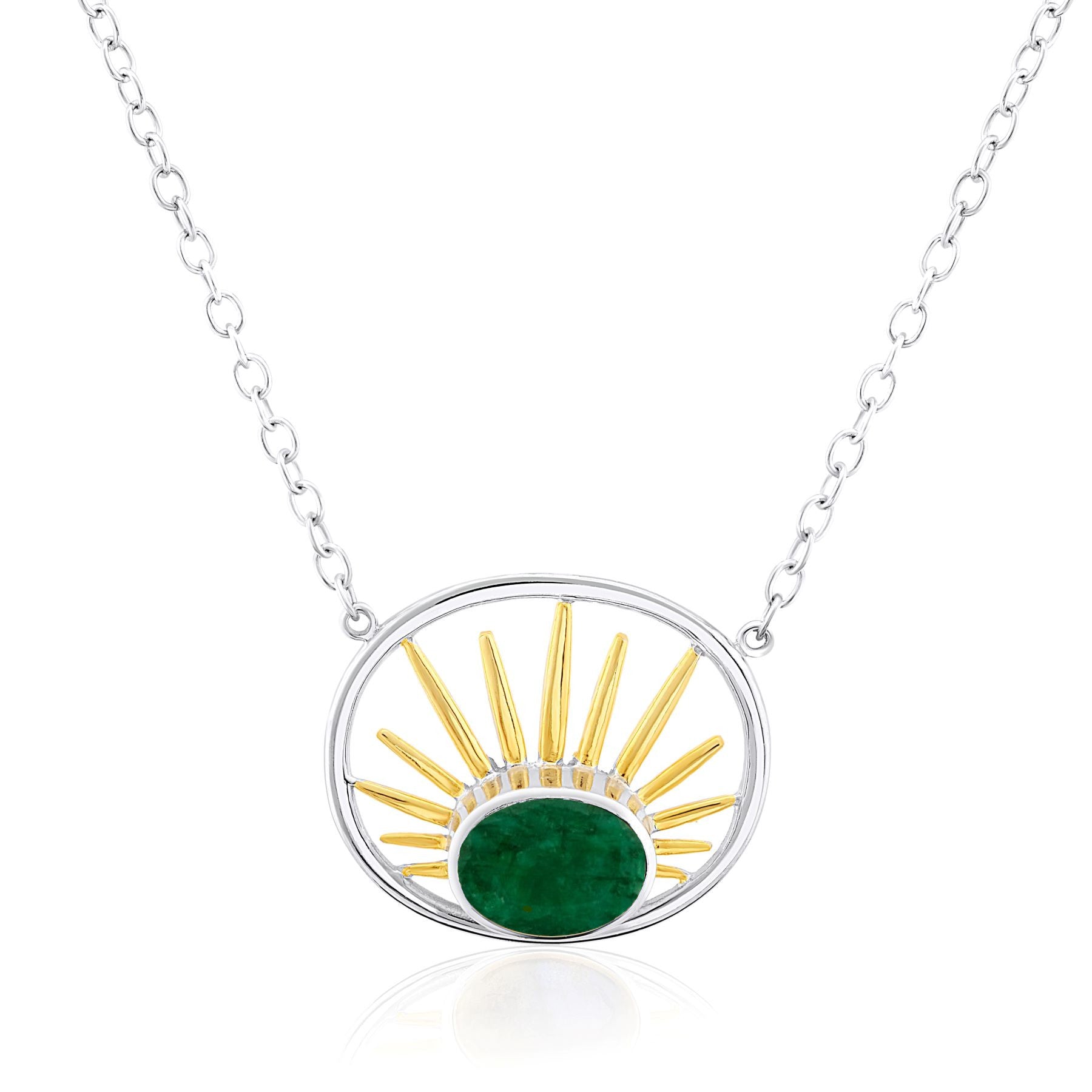 A Goddess Necklace Small in various gemstones featuring a circular pendant with a green gemstone at the bottom center. Golden sunray-like spikes emanate upward from the gem within the sterling silver round frame by Gallardo & Blaine Designs. The pendant i
