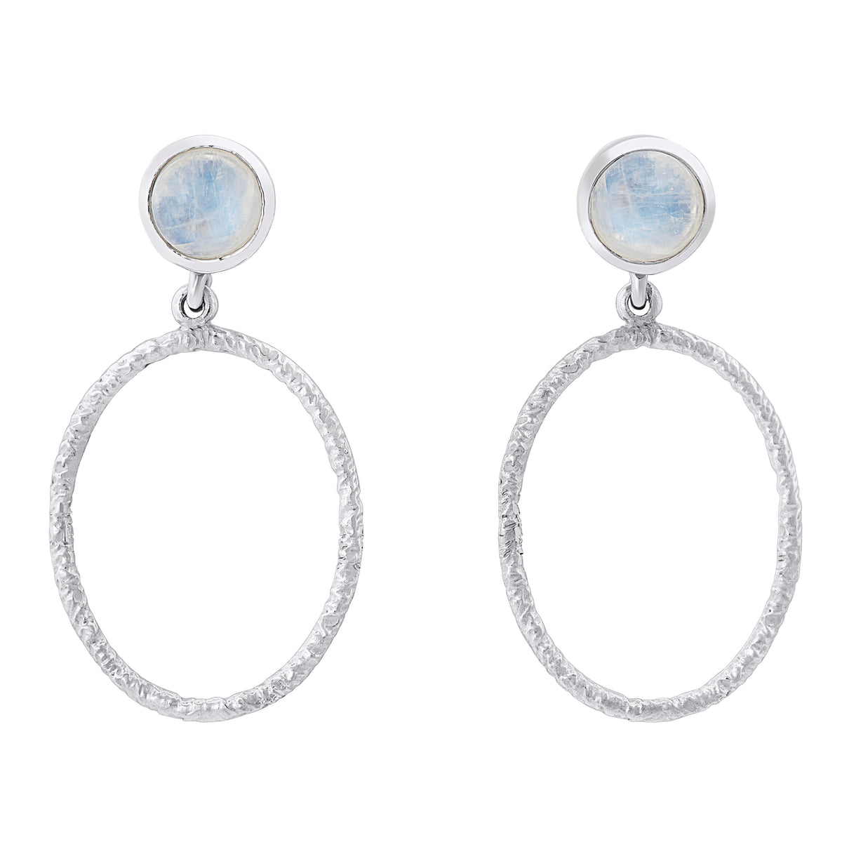 A pair of elegant Lunar Earrings in various gemstones by Gallardo & Blaine Designs featuring circular, textured hoops dangling from small round blue stone studs. The stones at the top have a soft, translucent appearance, adding a subtle touch of color to