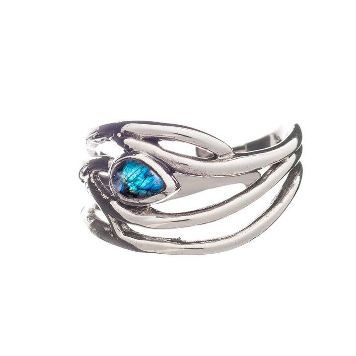 A Peacock Ring in various gemstones featuring a unique design mimicking branches or vines, with a central teardrop-shaped blue gemstone. The intricate detailing of this elegant dainty ring creates an artistic appearance, adjustable in silver & gold by Gal