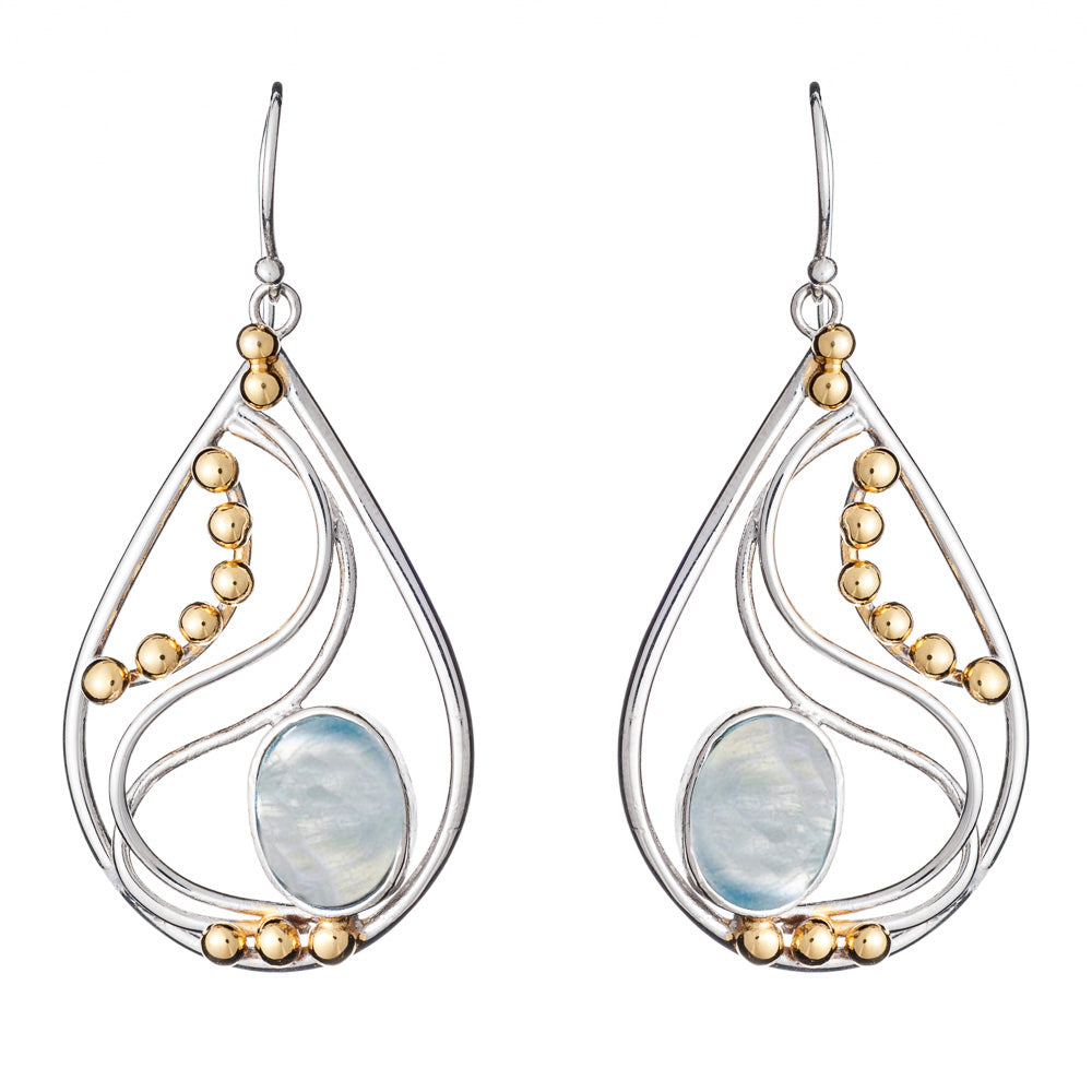 A pair of Phoenix Earrings in various gemstones featuring a combination of silver and gold tones. These elegant teardrop-shaped earrings by Gallardo & Blaine Designs have a large central opalescent stone, accented by curved silver lines and small gold sph