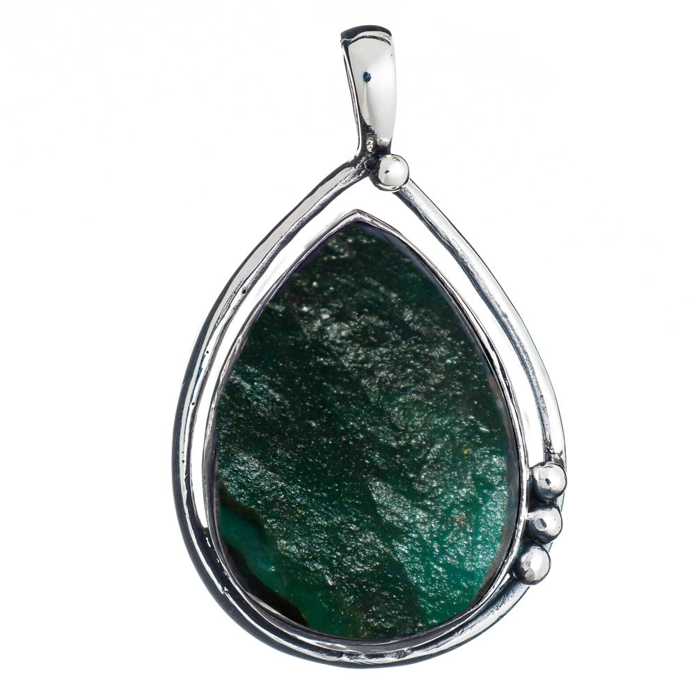 Introducing the **Poppy Pendant Large in various gemstones**: A teardrop-shaped pendant featuring a mesmerizing labradorite stone set in a sleek, sterling silver frame with three small, round silver accents along one side. The stone has a textured, slight