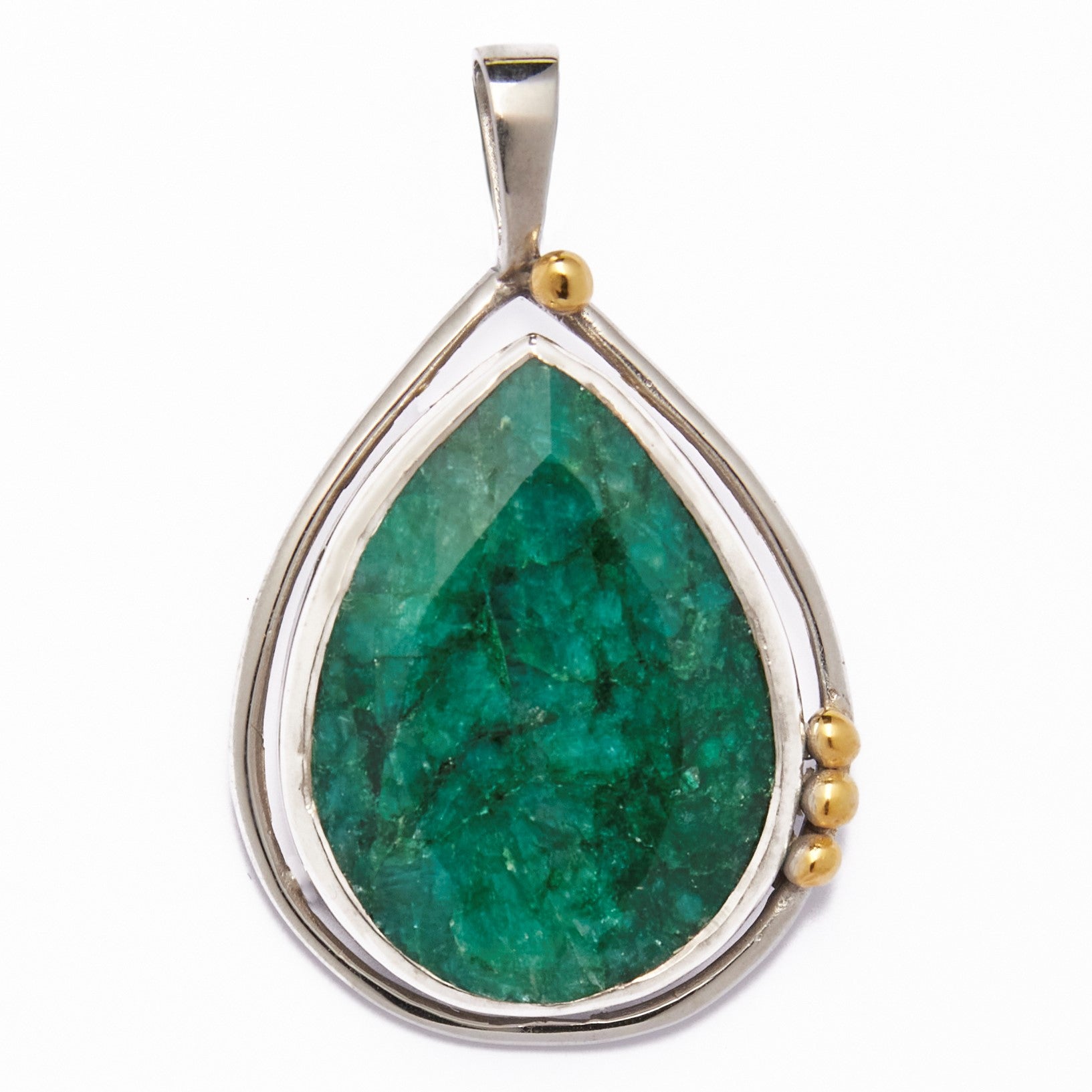 The Poppy Pendant Large in various gemstones by Gallardo & Blaine Designs features a teardrop-shaped design with a large, green labradorite stone at its center, encased in a sterling silver frame. Adorned with small gold accents on one side, it creates an