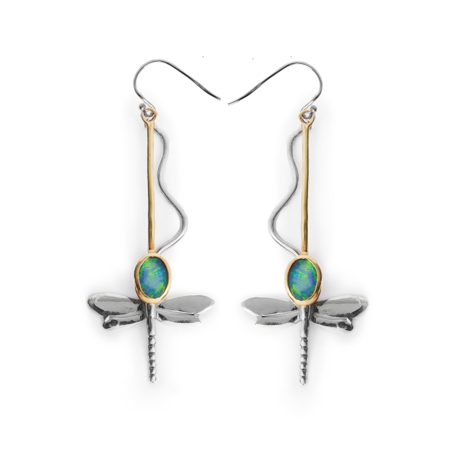 The Willow Earrings in Various Gemstones by Gallardo & Blaine Designs are a pair of dangle earrings shaped like dragonflies, crafted from silver and gold. Each earring features a blue-green oval gemstone as the dragonfly's thorax, with delicate wings and