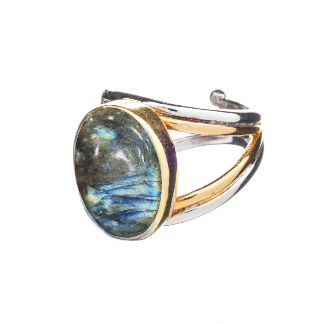 The Dewberry Ring by Gallardo & Blaine Designs features an oval blue-green labradorite gemstone in a gold bezel, with sterling silver and gold vermeil accents, shown on a white background.