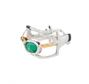 An intricate Small Dragonfly Ring in various gemstones by Gallardo & Blaine Designs featuring a prominent green gemstone in an oval shape. The band has unique, abstract details with additional small elements. This adjustable ring showcases a modern and ar