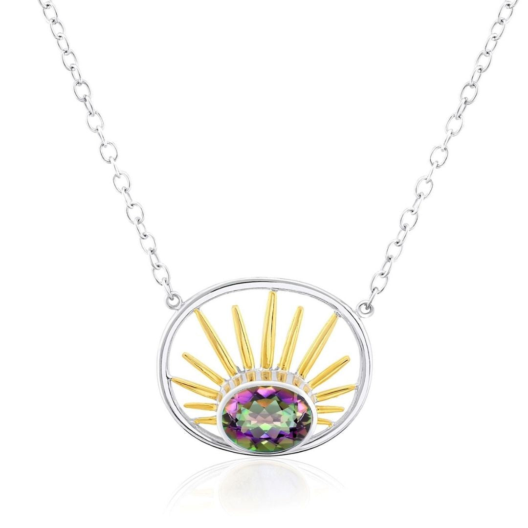 The Goddess Necklace Small by Gallardo & Blaine Designs features a sterling silver oval pendant with gold sun rays and a faceted, multicolored gemstone at the center, inspired by goddess energy.