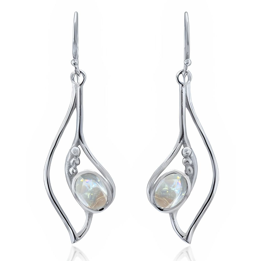 The Iris Earrings by Gallardo & Blaine Designs feature an abstract silver and gold dangle design with round iridescent gemstones, suspended from simple hooks—available in various gemstone options.