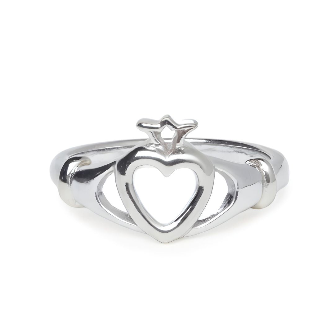 The Lorien Ring by Watermelon tropical is a sterling silver Claddagh ring with a crowned heart-shaped centerpiece, held on each side by hands.