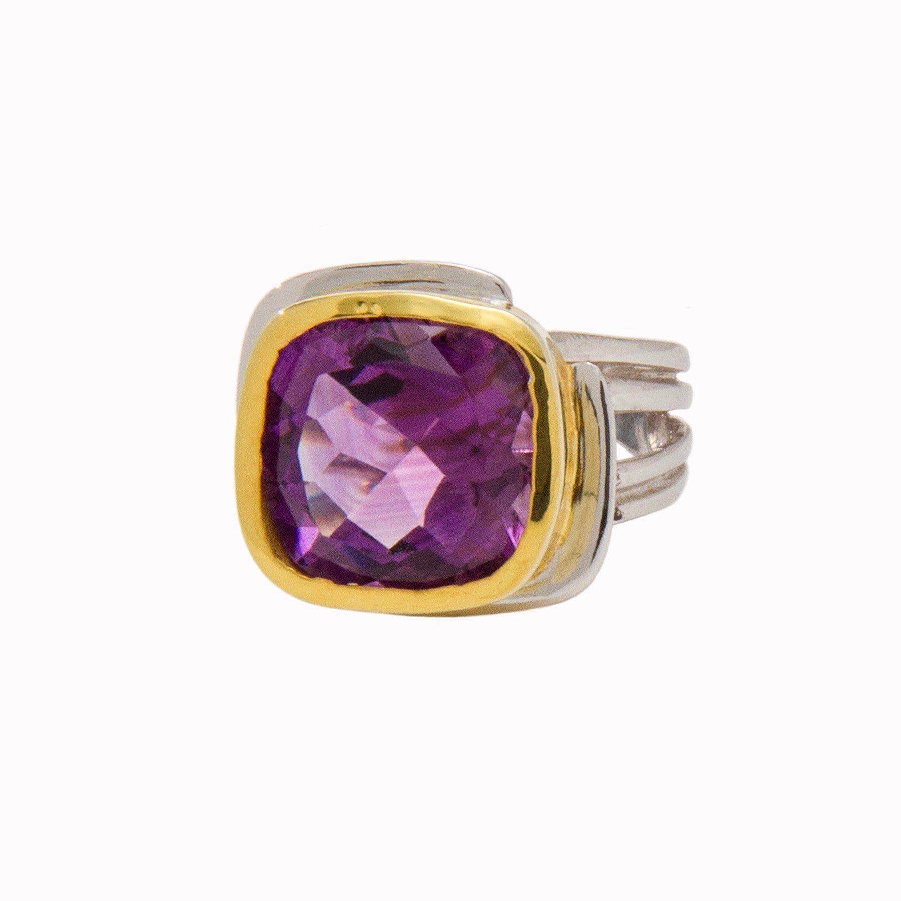 This **Art Deco Ring in Silver Gold & various gemstones** by **Gallardo & Blaine Designs**, made of sterling silver with a gold vermeil bezel, features a large, square-cut purple gemstone. The band elegantly splits into three sections, creating a sturdy a