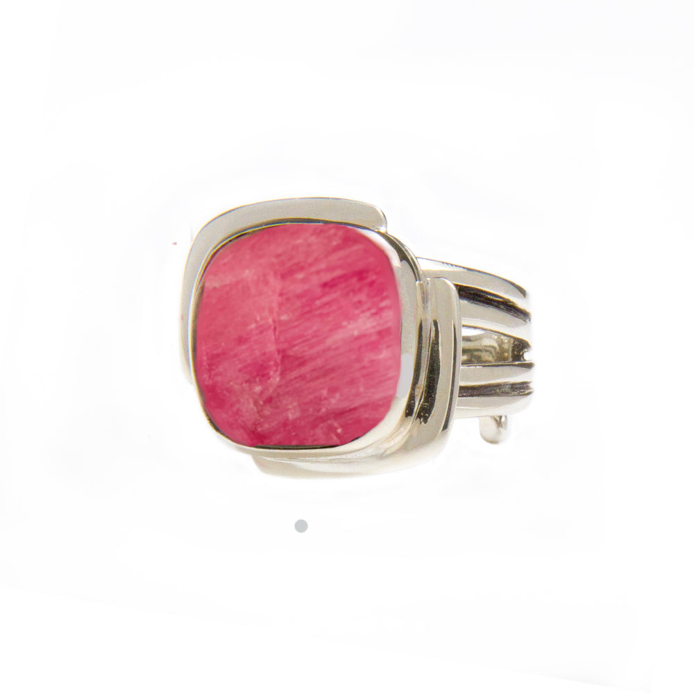 A Gallardo & Blaine Designs Art Deco Ring in Silver Gold & various gemstones with a large, square-cut pink gemstone in the center is displayed against a white background. The band has a split design, adding an elegant touch to the overall appearance of th