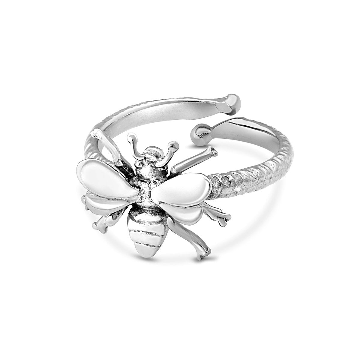 The Wildlife Bee Ring Silver by Watermelon Tropical features a detailed bee with white enamel wings and a textured band, perfect for nature lovers. Shown on a plain white background.