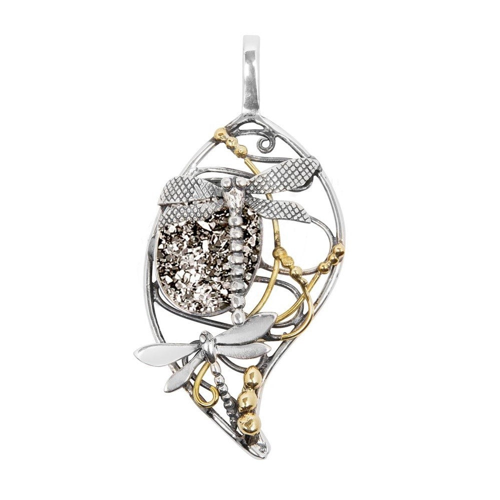 The Bullrush Pendant in various gemstones by Gallardo & Blaine Designs features two dragonflies with silver and gold accents on a detailed leaf-shaped frame—an elegant choice for dragonfly jewelry lovers.