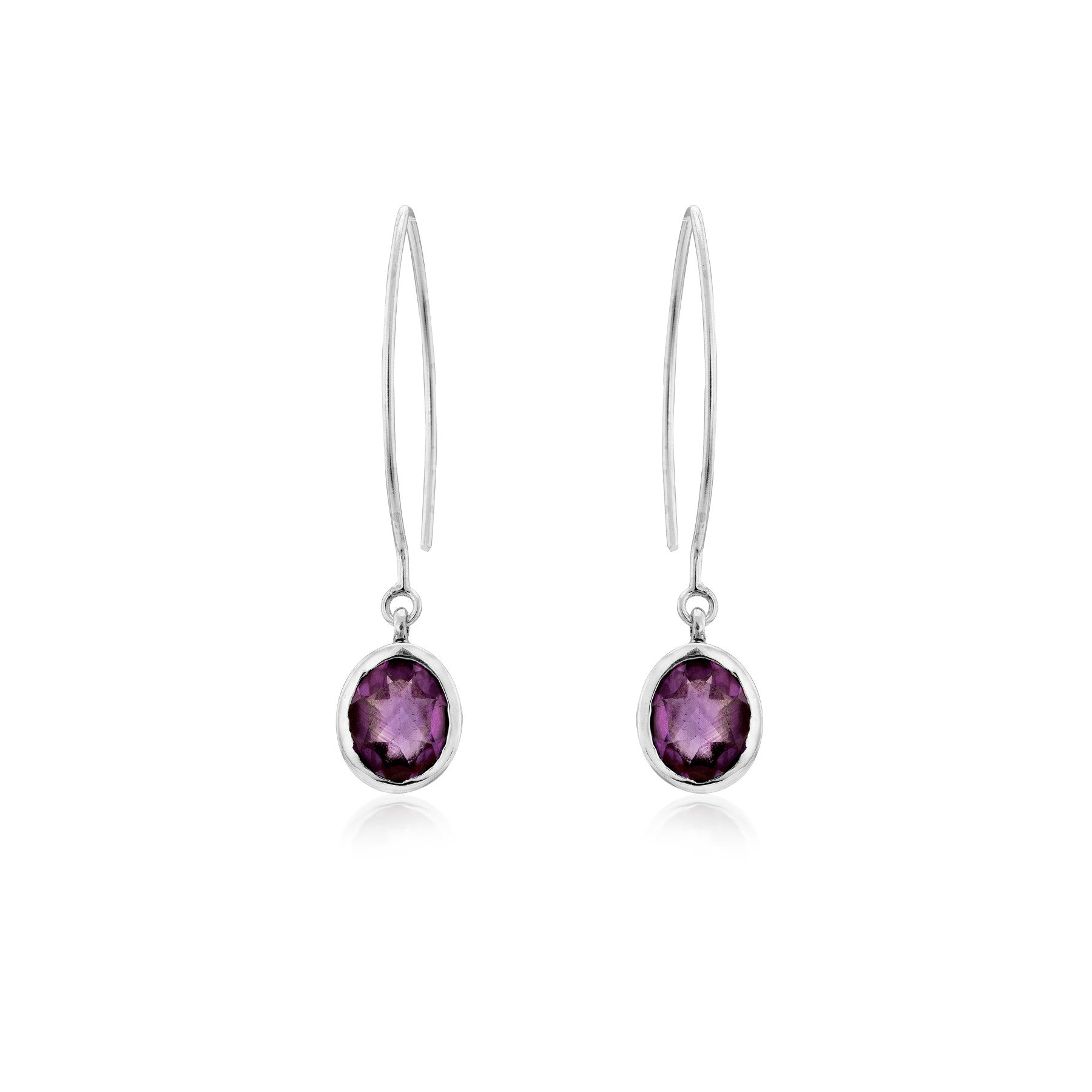 A pair of elegant sterling silver drop earrings featuring oval-shaped purple gemstones. Each earring has a thin, sleek hook leading to a bezel setting that holds the amethyst-like stones. The reflective, faceted gemstones add a touch of sophistication to 