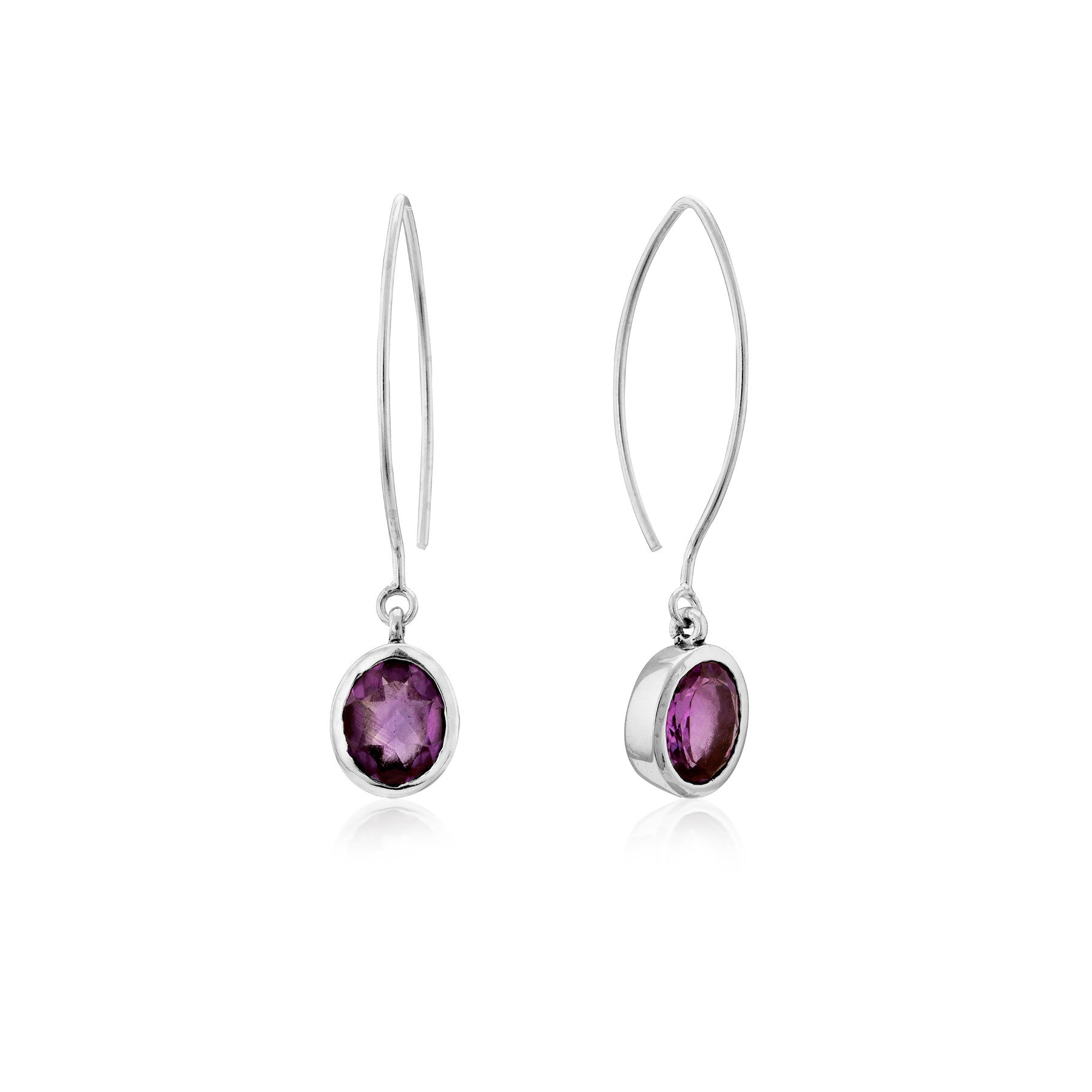A pair of Dew Drop Earrings in various gemstones by Gallardo & Blaine Designs featuring round, faceted purple gemstones set in elegant sterling silver. The simple, curved hooks allow the gemstones to dangle freely, while the clean design emphasizes the vi