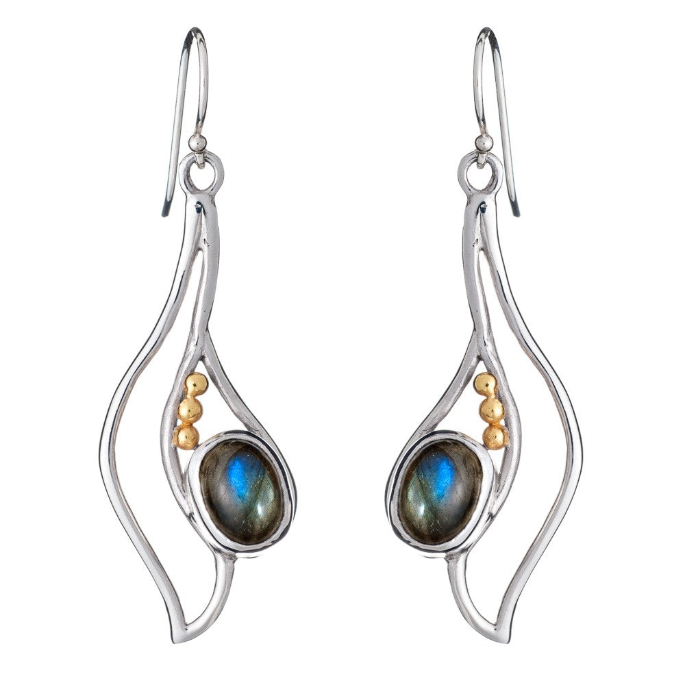 Introducing the Iris Earrings in various gemstones by Gallardo & Blaine Designs: a pair of stunning silver & gold drop earrings featuring an abstract, flowy design. Each earring is adorned with a dark oval gemstone at the center, accented by small gold be