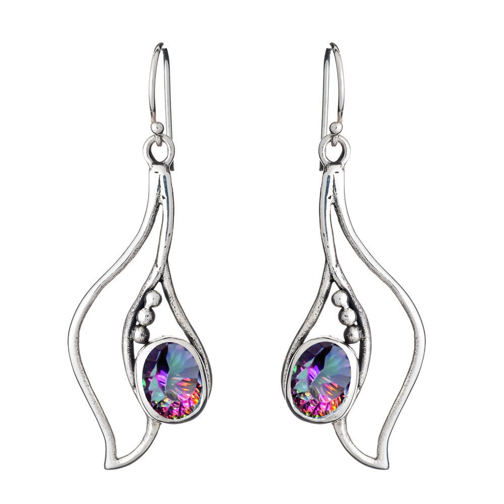 The Iris Earrings in various gemstones by Gallardo & Blaine Designs are a pair of elegant silver & gold earrings with a unique design featuring flowing, wave-like shapes. Each earring showcases a small, round, colorful gemstone with iridescent hues. These