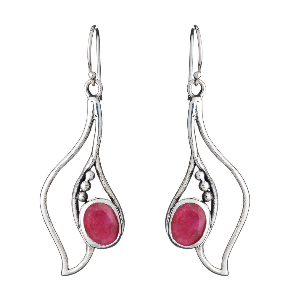The Iris Earrings in various gemstones by Gallardo & Blaine Designs are a pair of stunning silver dangle gemstone earrings with flowing, abstract designs. Each earring features a pink oval gemstone set in the center, complemented by three small silver bea