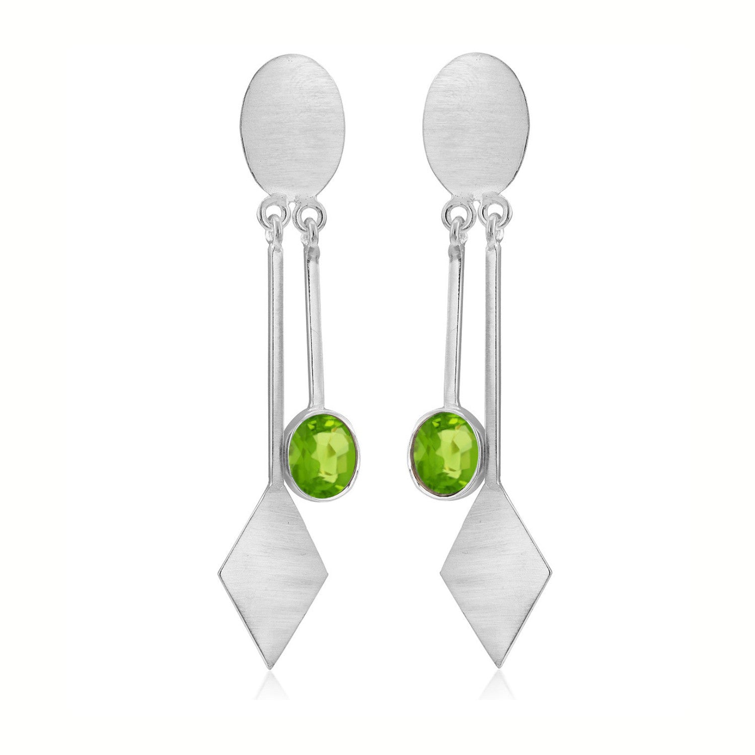 A pair of Karo Earrings in various gemstones by Gallardo & Blaine Designs. Each earring features an oval stud connected to a diamond-shaped pendant by a thin bar, with a single round green gemstone set in the middle section. The design is sleek and contem
