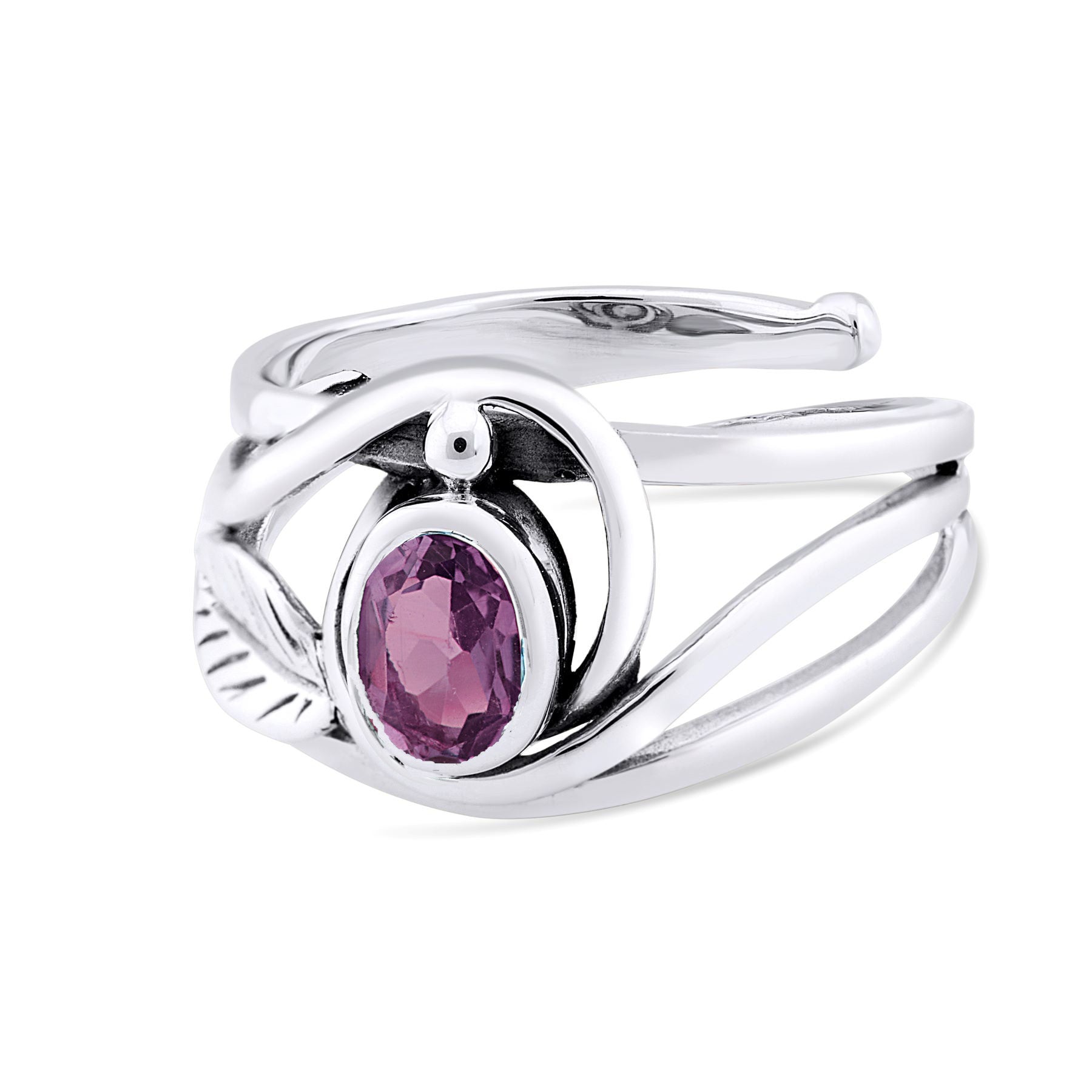 A silver and gold ring features an intricate, twisting design with a central, oval-shaped purple gemstone. The band splits into two delicate loops on each side of the gemstone, with a small leaf detail on one end, adding an elegant touch. This Leaf Ring i
