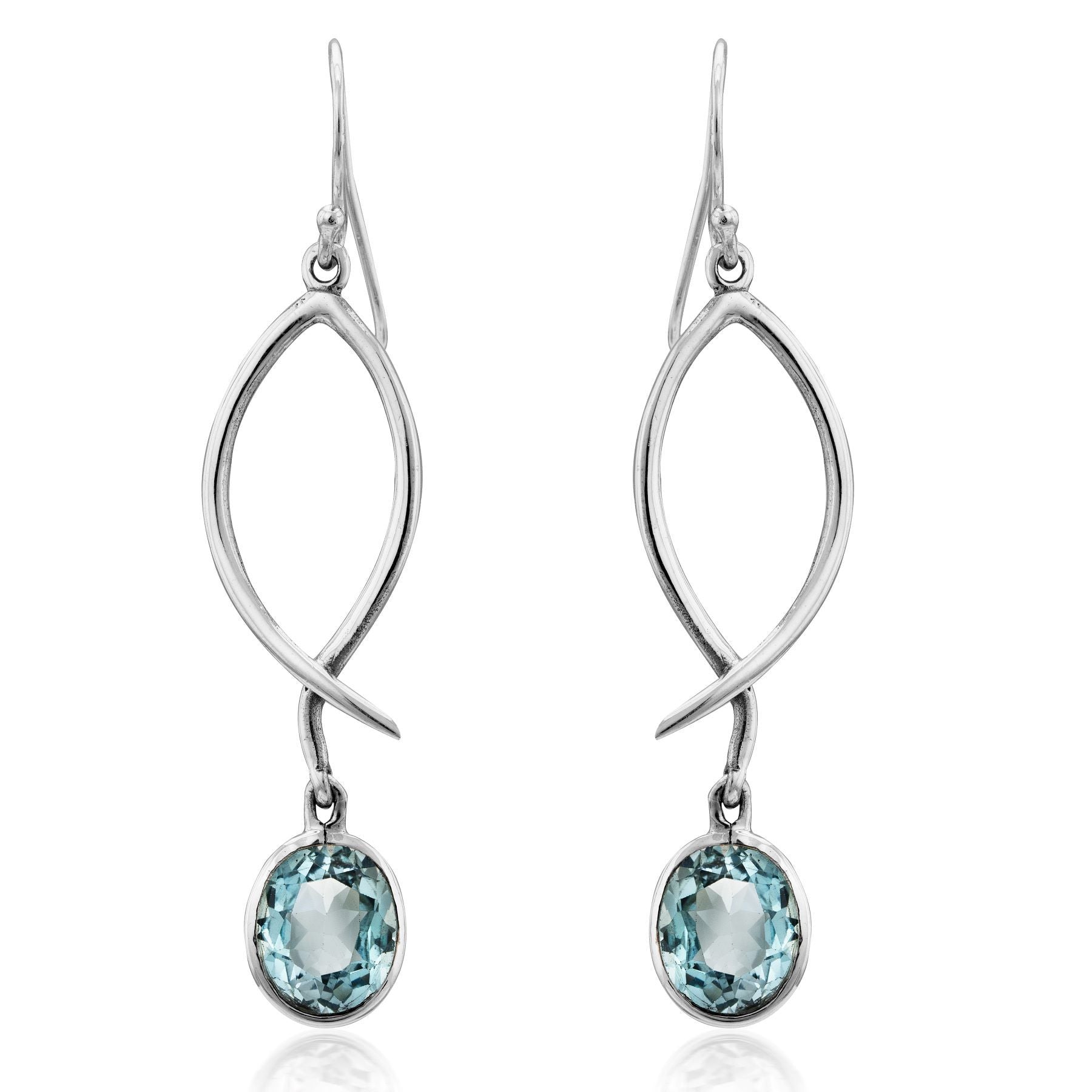 Graceful and elegant, the Lupin Earrings in various gemstones by Gallardo & Blaine Designs feature a twisting silver design with light blue, faceted oval gemstones at each twist's end. These versatile earrings add sparkling elegance to any outfit and make