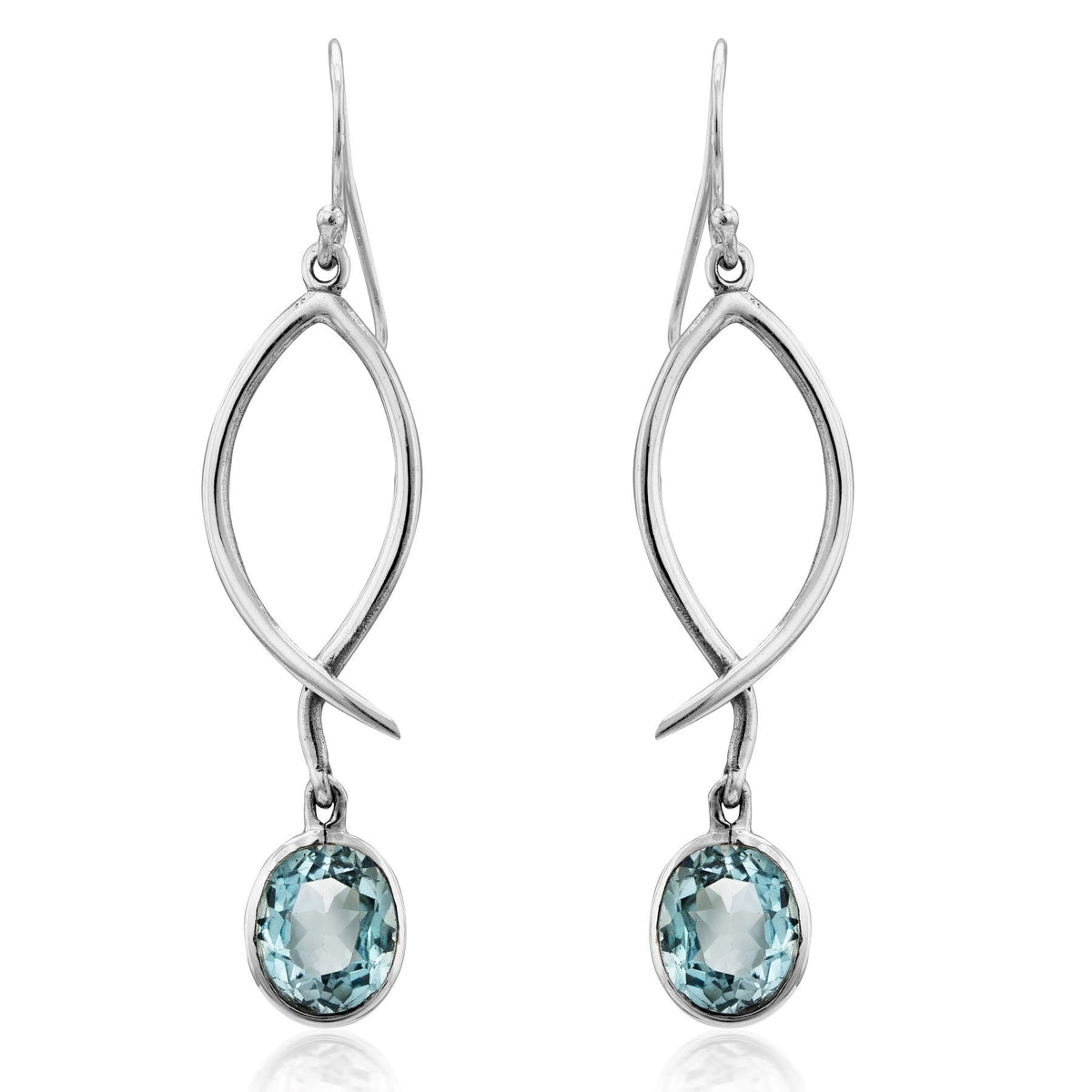 Graceful and elegant, the Lupin Earrings in various gemstones by Gallardo & Blaine Designs feature a twisting silver design with light blue, faceted oval gemstones at each twist's end. These versatile earrings add sparkling elegance to any outfit and make
