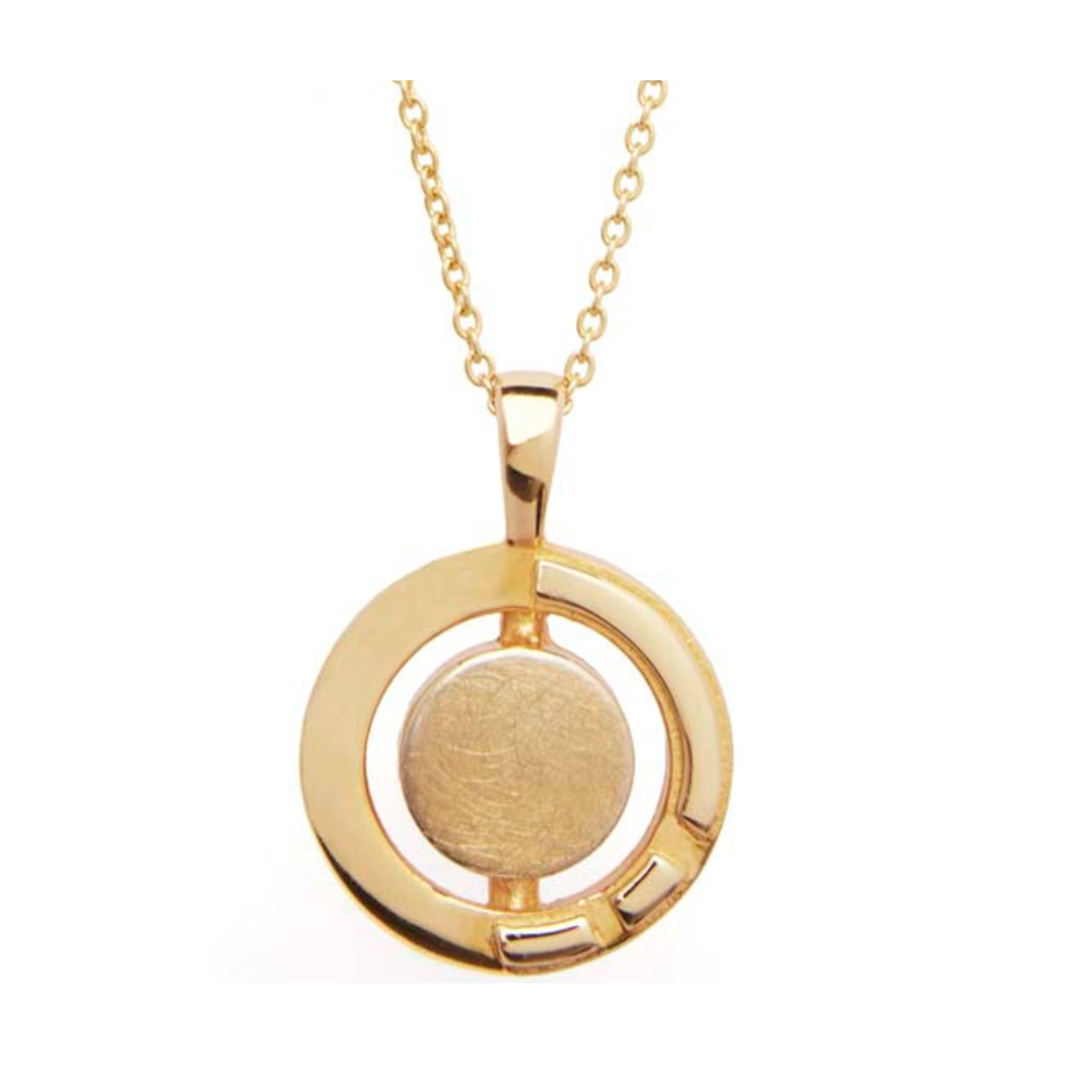 The Urú Large Pendant & Chain by Gallardo & Blaine Designs is a delicate gold pendant necklace featuring a circular design. The pendant has a smooth, round center encircled by a donut-shaped gold border with cut-out sections and three small, rectangular 
