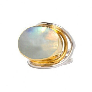 A statement Party Ring in various gemstones featuring an oval, iridescent white stone set in a creative, intertwined metal band composed of sterling silver & gold tones. The stone displays a subtle spectrum of colors, and the overall design is modern and 