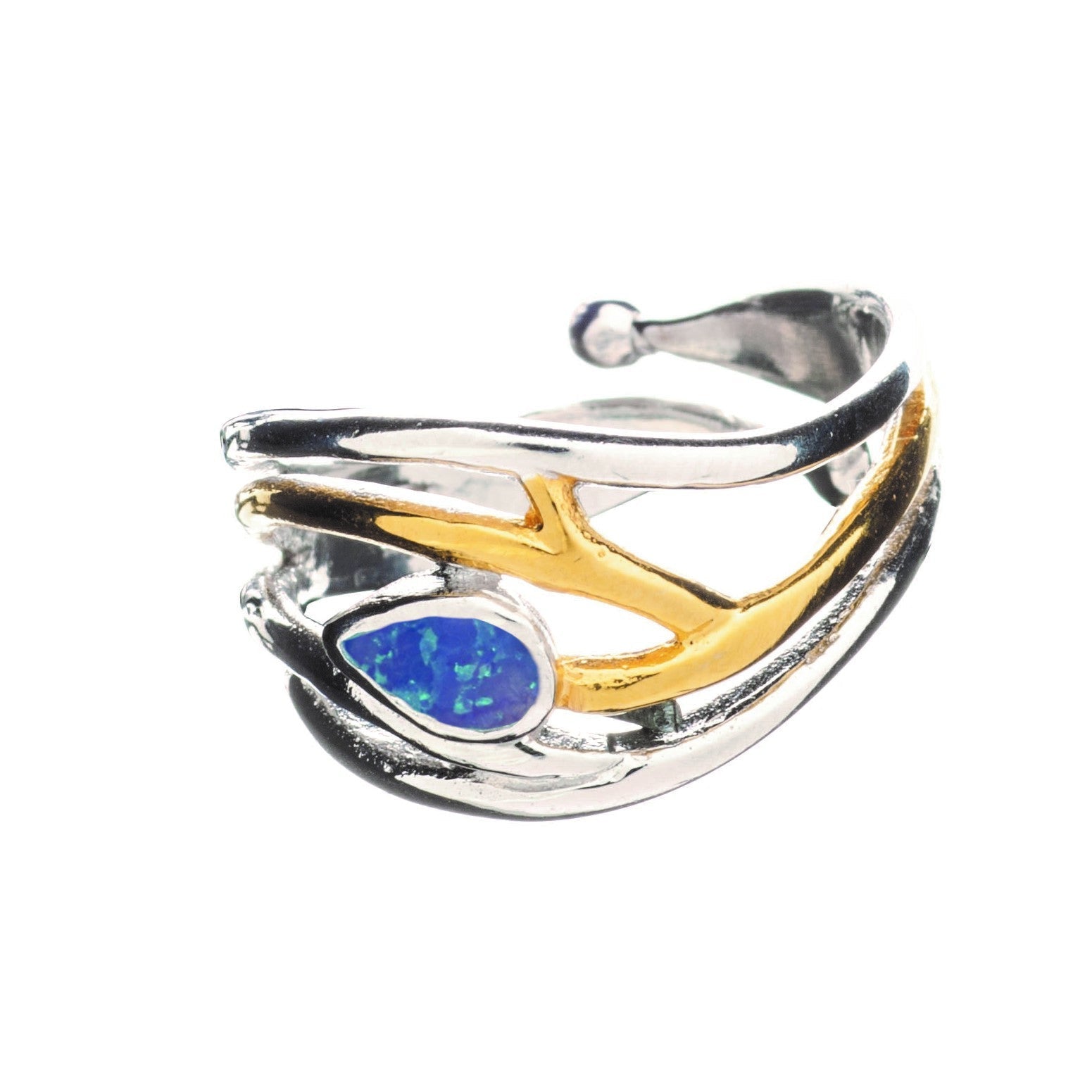 A stylish, adjustable **Peacock Ring in various gemstones** by **Gallardo & Blaine Designs** in silver and gold with an intricate design resembling tree branches. It features a teardrop-shaped blue opal stone as the centerpiece, making it an elegant daint