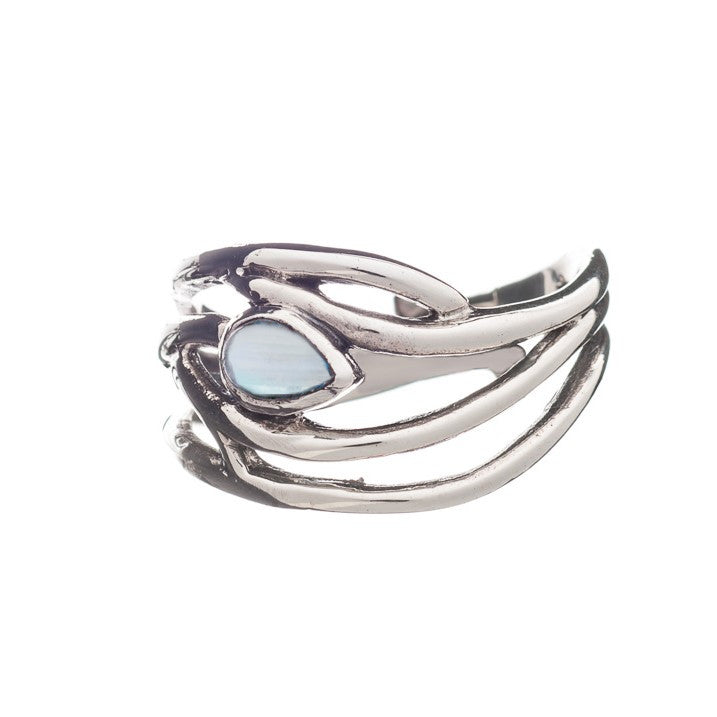 A sleek silver ring featuring a unique design with intertwined bands and a central teardrop-shaped opal gemstone. The Peacock Ring in various gemstones by Gallardo & Blaine Designs boasts an adjustable feature in both silver and gold, offering an exquisit