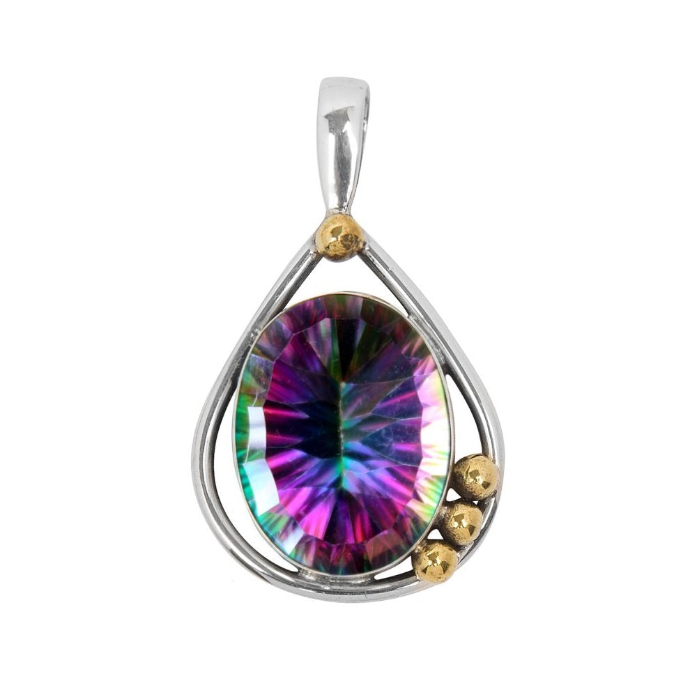 The Poppy Pendant Small in various gemstones by Gallardo & Blaine Designs is a teardrop-shaped piece featuring a large, oval iridescent gemstone in the center. The gemstone displays shades of purple, green, and blue. Its sterling silver setting is adorned
