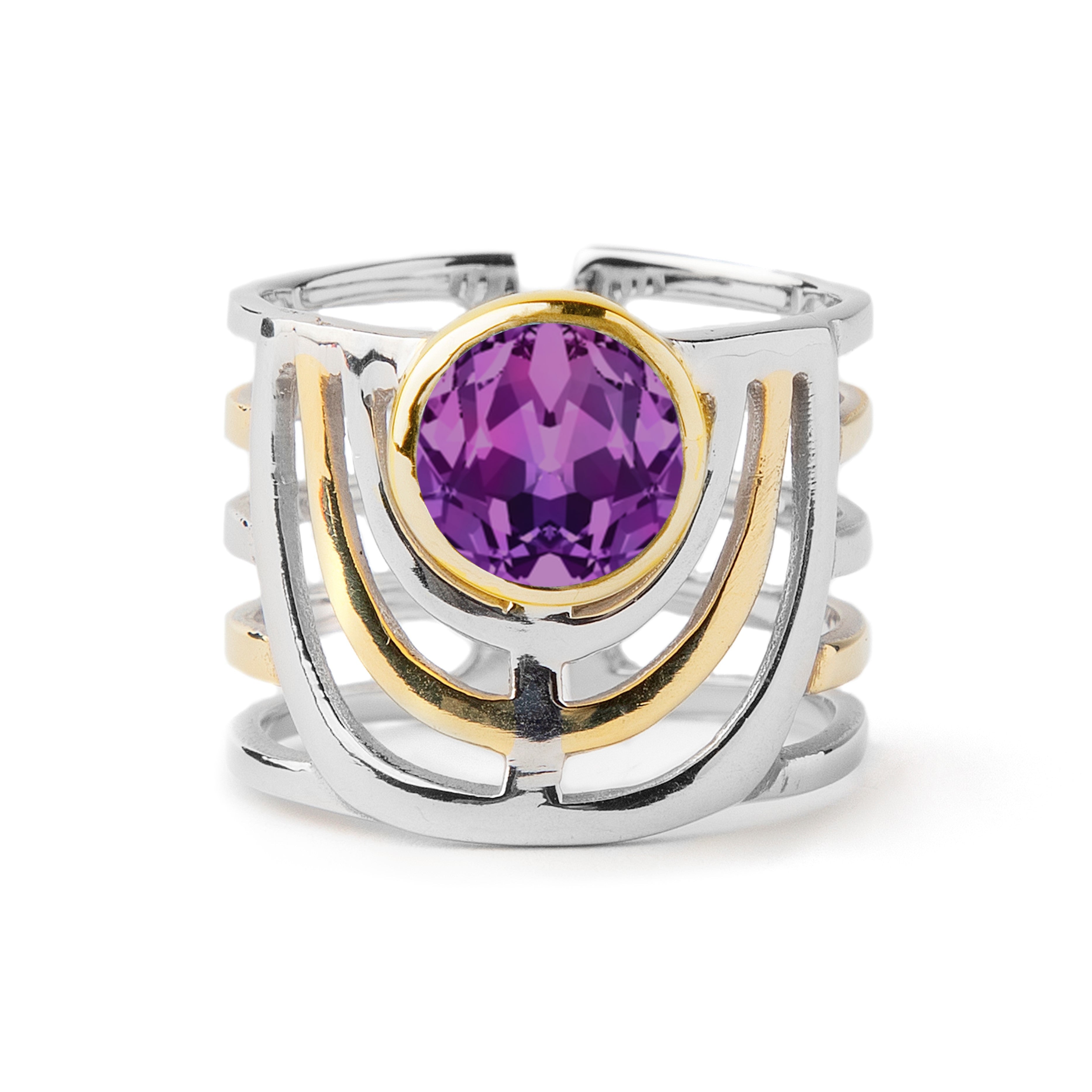 Image of the Gallardo & Blaine Designs Solar Ring in various gemstones, intricately designed and featuring a large, round purple gemstone at the center. The band is crafted from silver and gold, forming an open, lattice-like structure. The bold jewellery 