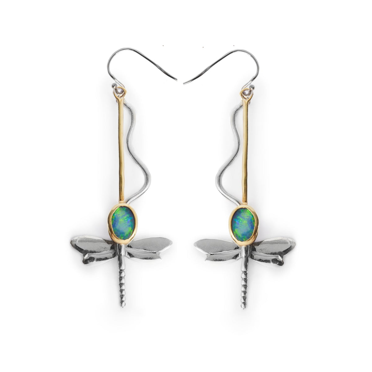 The Willow Earrings in Various Gemstones by Gallardo & Blaine Designs are a pair of dangle earrings shaped like dragonflies, crafted from silver and gold. Each earring features a blue-green oval gemstone as the dragonfly's thorax, with delicate wings and 