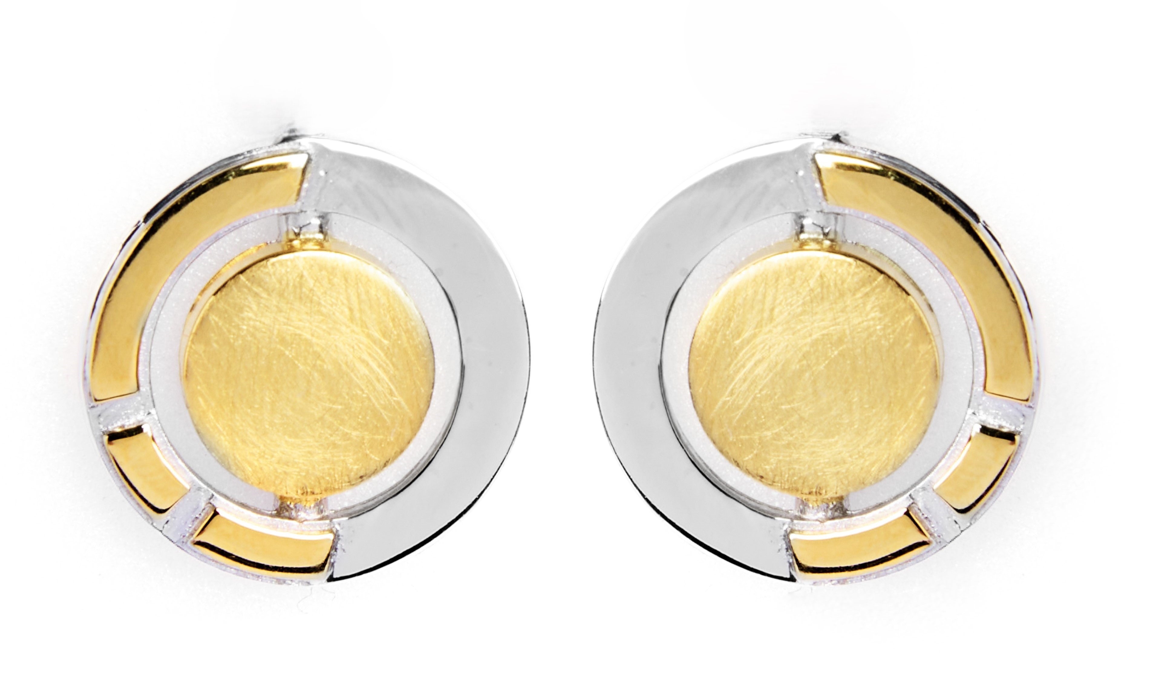 The Urú Studs by Gallardo & Blaine Designs feature a modern, geometric design with gold centers and sterling silver outer rings, accented by fine silver lines—an elegant nod to classic Irish jewelry.